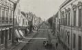 Der Neue Weg im Jahre 1905 mit der Deichmühle im Hintergrund. Der Fotograf steht an der Kreuzung zur Osterstraße.
